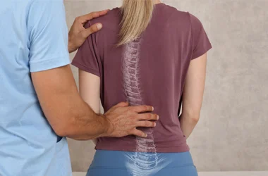 Chiropractor providing chiropractic care to a patient.